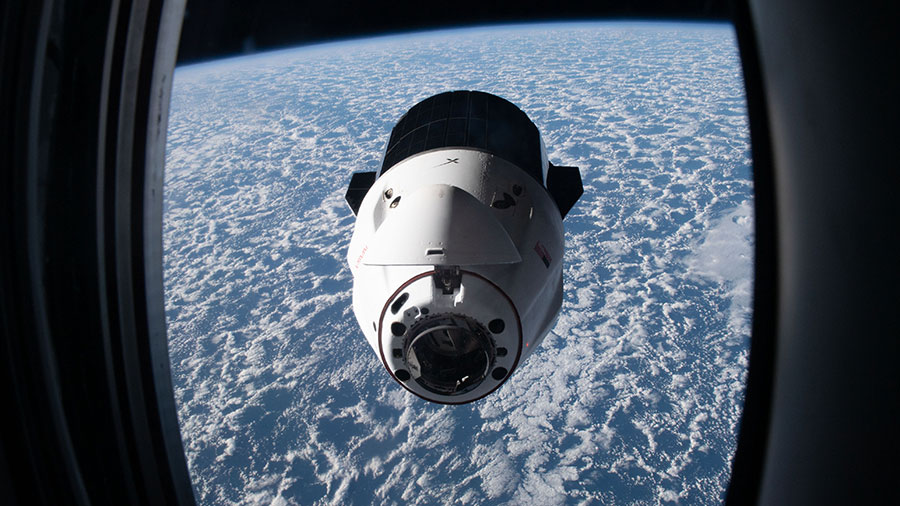 The SpaceX Dragon resupply ship carrying over 5,800 pounds of cargo approaches the space station above the south Atlantic Ocean on July 16, 2022.