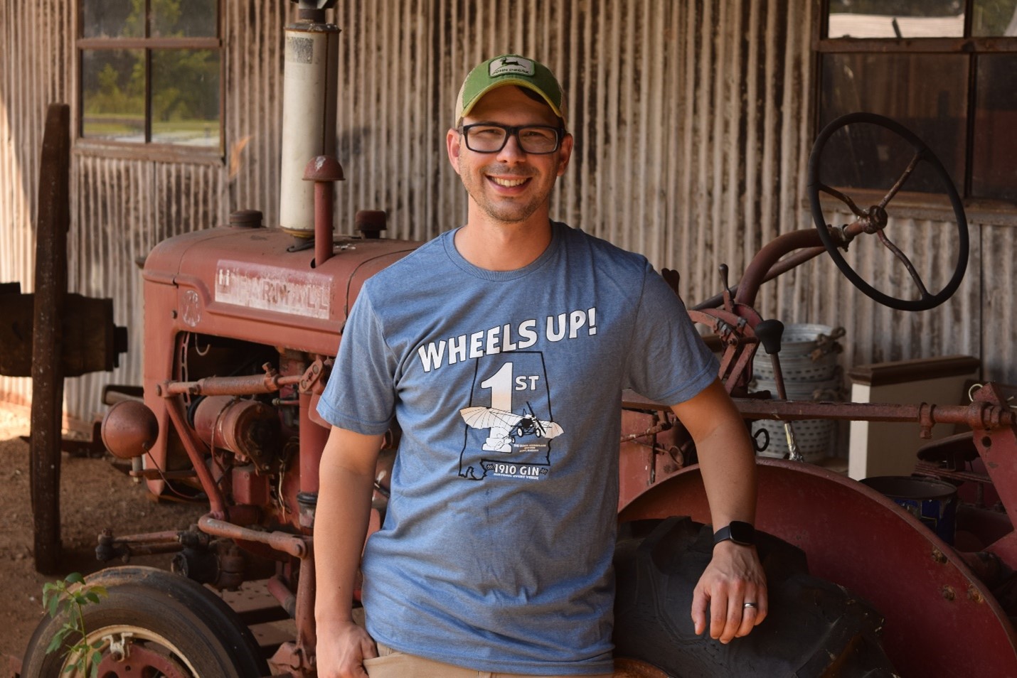 Patrick Duran, a research scientist at NASA’s Marshall Space Flight Center, with his neighbor's tractor. 