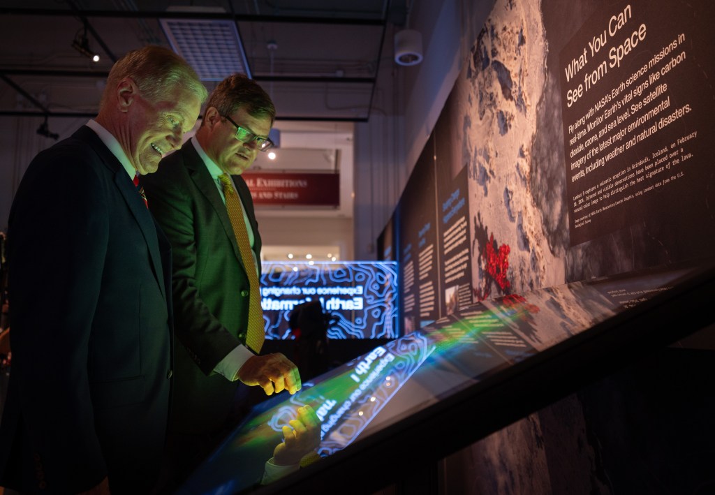 NASA Administrator Bill Nelson, left, and Smithsonian Museum of Natural History, Sant Director, Kirk Johnson, preview the Earth Information Center at the Smithsonian National Museum of Natural History, in Washington, Monday, Oct. 7, 2024.