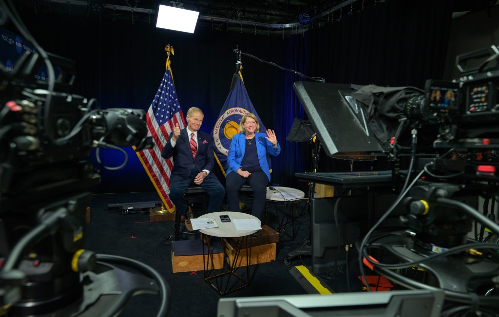 NASA Administrator Bill Nelson, left, and NASA Deputy Administrator Pam Melroy are seen during an Earth-to-space call with astronauts aboard the International Space Station, Wednesday, Jan. 8, 2025, at the Mary W. Jackson NASA Headquarters building in Washington.