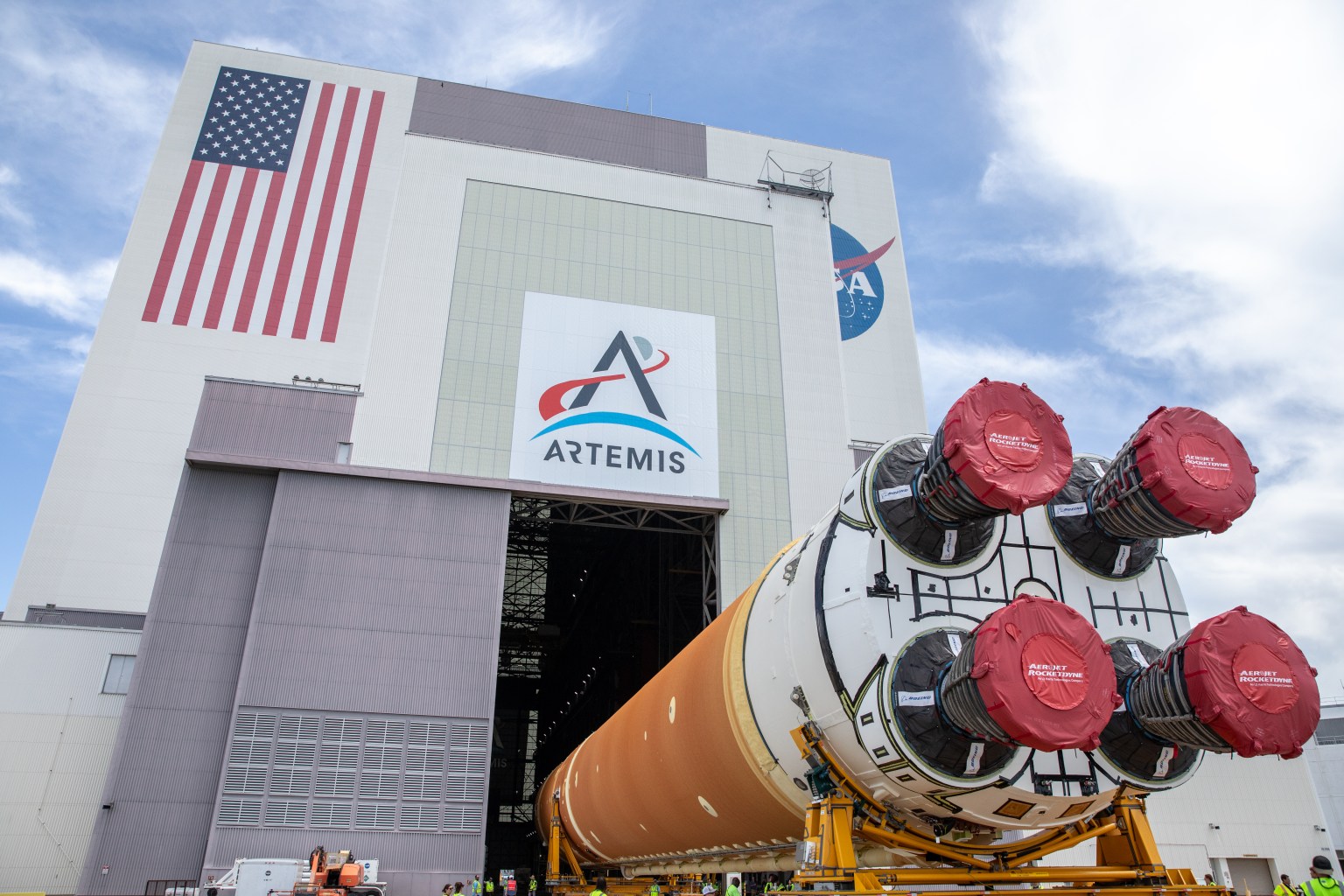 After completing its journey from NASA's Michoud Assembly Facility in New Orleans aboard the Pegasus barge, teams with Exploration Ground Systems (EGS) transport the agency's powerful SLS (Space Launch System) core stage to NASA's Kennedy Space Center's Vehicle Assembly Building in Florida on Tuesday, July 23, 2024. Once inside, SLS will be prepared for integration atop the mobile launcher ahead of the Artemis II launch.