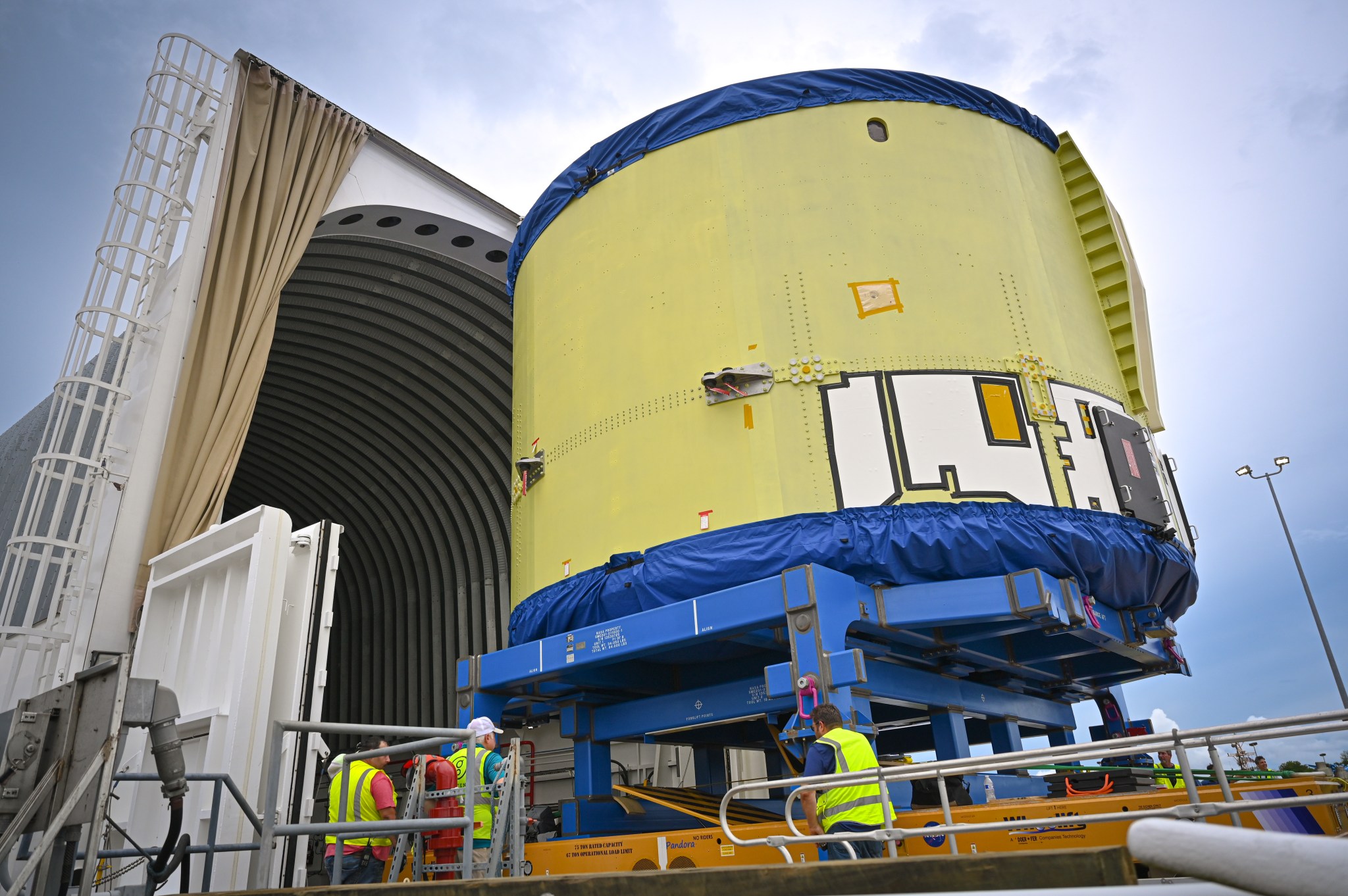 The core stage engine section of the SLS (Space Launch System) rocket for Artemis IV is loaded onto the agency’s Pegasus barge at Michoud Assembly Facility in New Orleans on Aug. 28. The core stage hardware will be moved NASA’s to Kennedy’s Space Systems Processing Facility for outfitting.