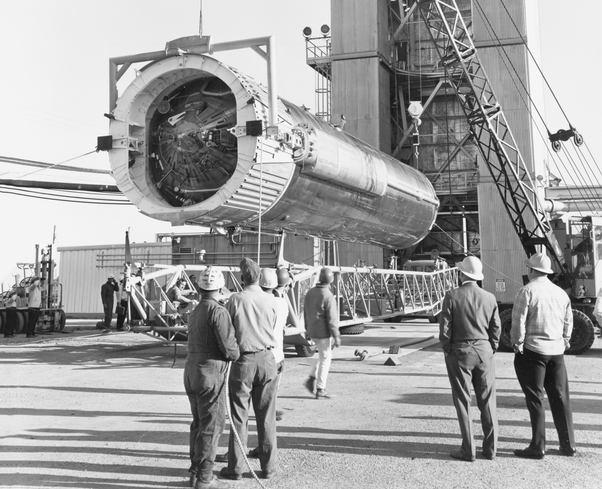 Rocket stage being lifted into tower.