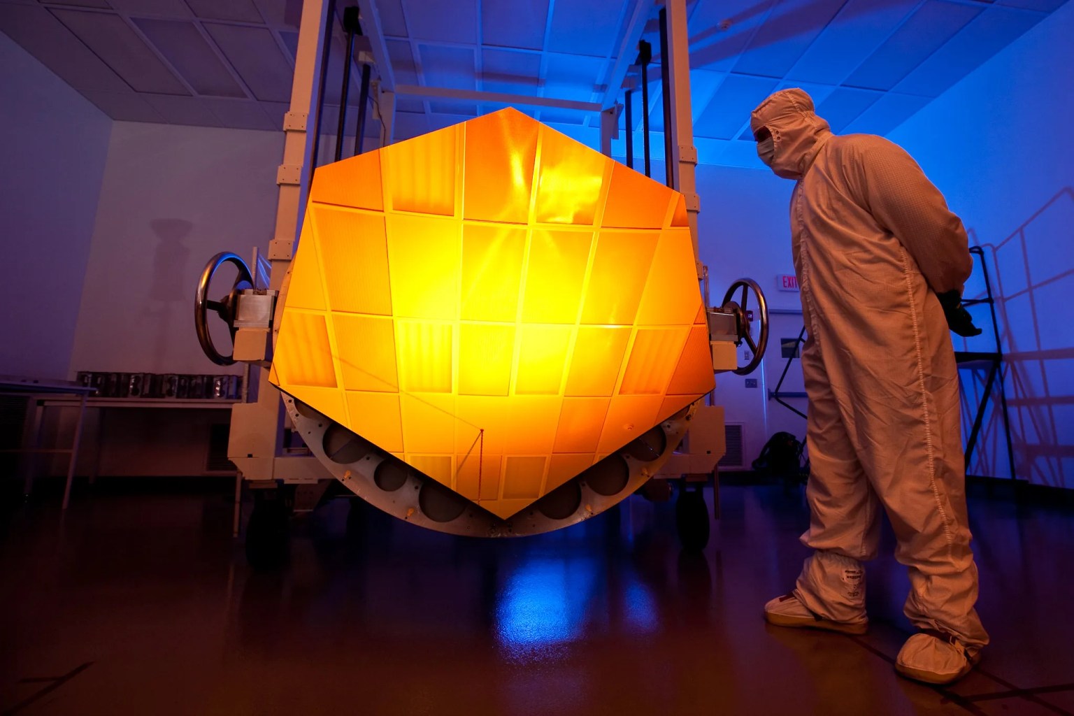 The James Webb Space Telescope's Engineering Design Unit (EDU) primary mirror segment, coated with gold.