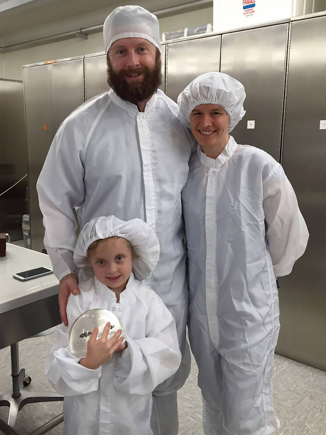 Daren Welsh and his family enjoy the Moon Rock Lab Tour at JSC