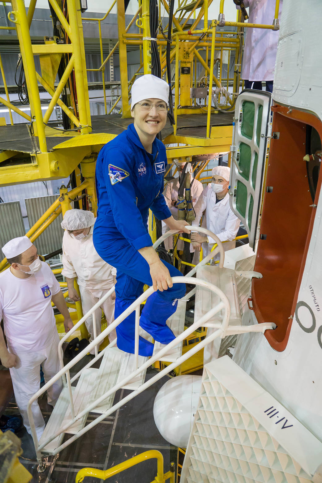 Expedition 59 crew member Christina Koch climbs aboard the Soyuz MS-12 spacecraft