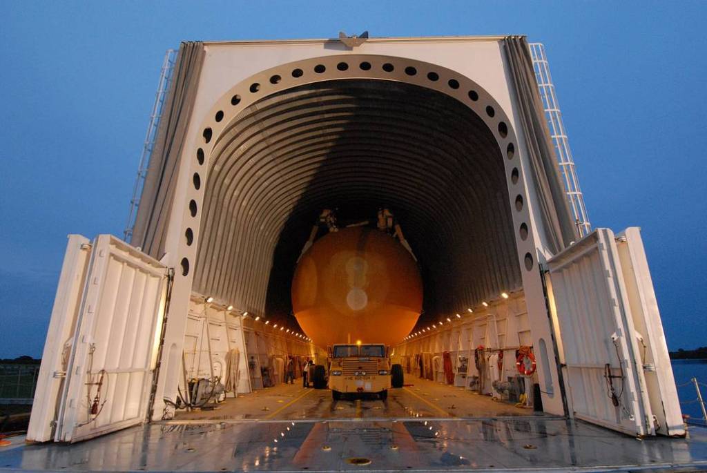 In the Launch Complex 39 Area at NASA's Kennedy Space Center in Florida, the external tank for space shuttle Atlantis' STS-125 mission to the Hubble Space Telescope sits ready for offloading from the Pegasus barge. 