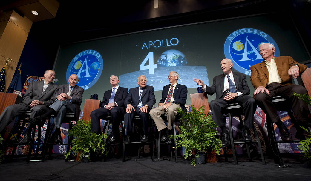 Apollo astronauts at news conference in NASA Headquarters auditorium