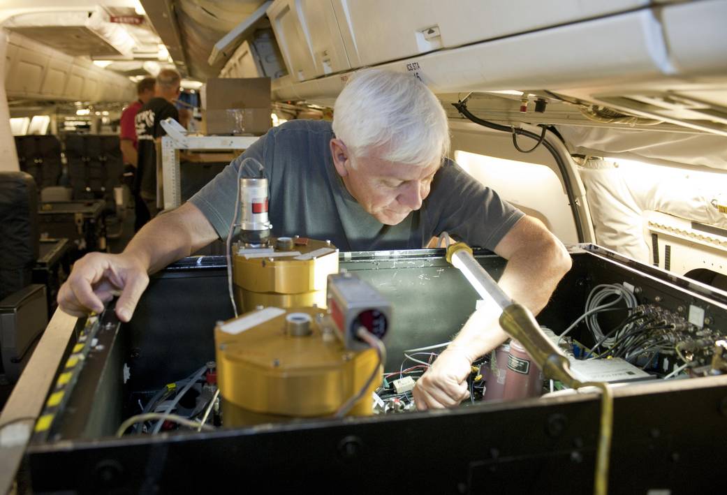 Researcher Adjusts DACOM on DC-8