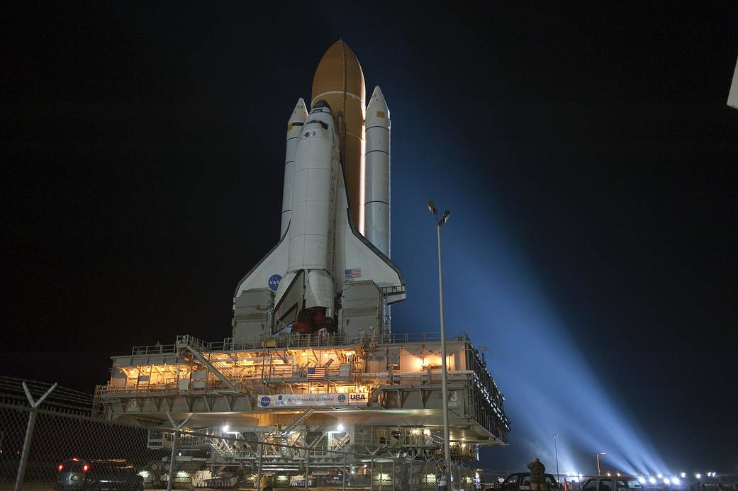 Space shuttle Discovery makes its second move out to the pad for the STS-133 mission following modifications to the shuttle's external tank.