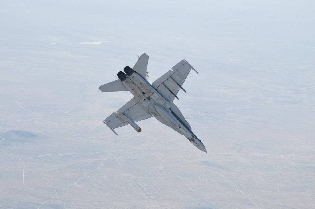 MSL Rolls With F/A-18 Mission Support Aircraft