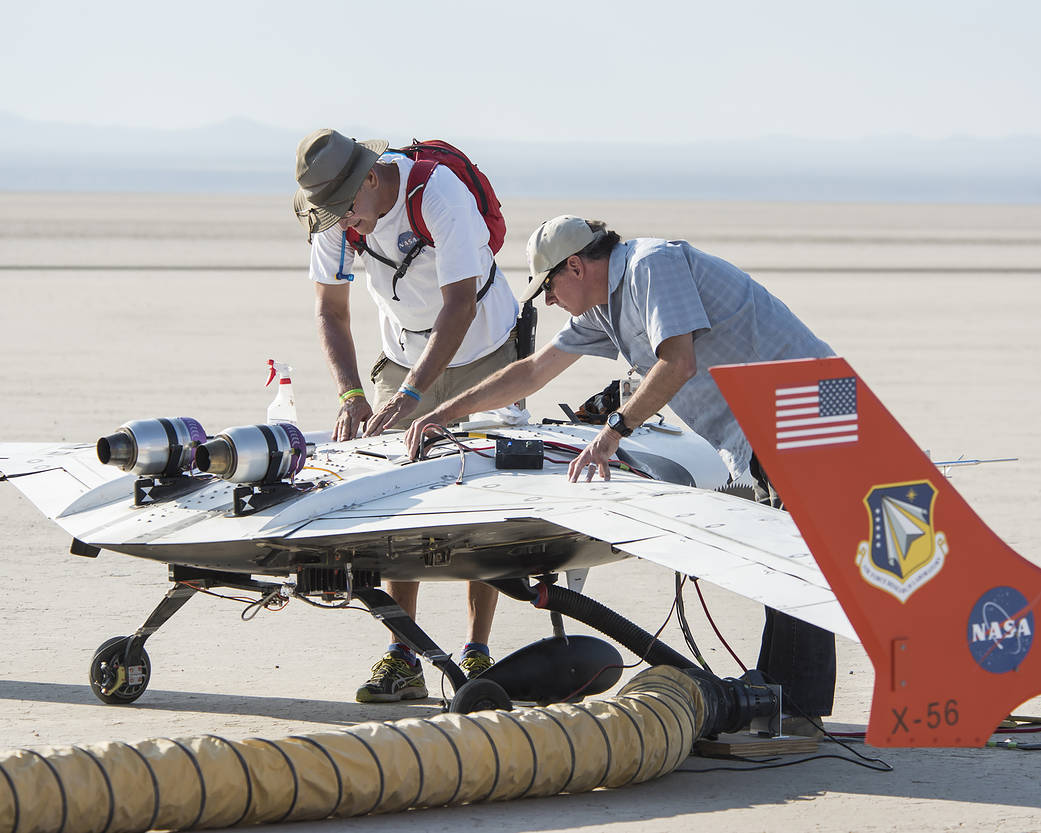 James Smith and Gary Cosentino prepare the X-56A for flight.