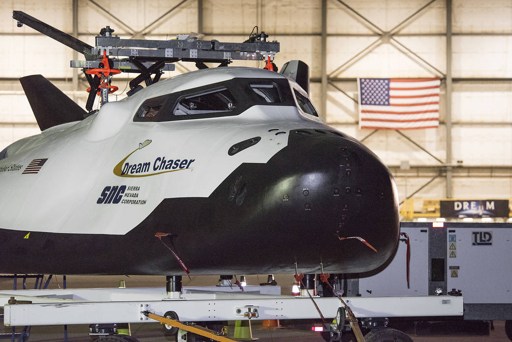 A lift device was attached to Sierra Nevada Corp’s Dream Chaser for a helicopter to pick it up.