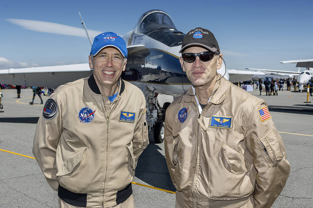 NASA Armstrong Flight Research Center pilots Paul Newton and Tim Williams stand by the Center’s F/A-18 research aircraft.