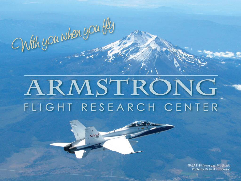 NASA F-18 flying past Mt. Shasta in California.