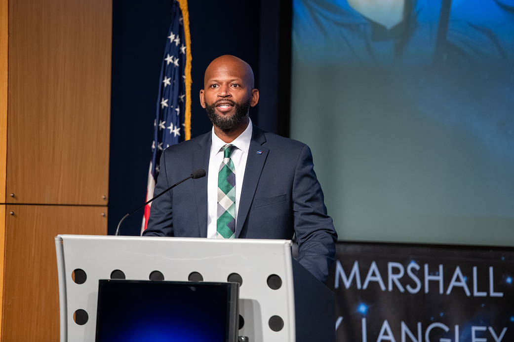 A photo of Special Assistant for Engagement and Equity Dr. Xaivian Raymond giving remarks at the inaugural Equity Stakeholder Town Hall on Wednesday, Sept. 28 at NASA 's Mary W. Jackson Headquarters in Washington.