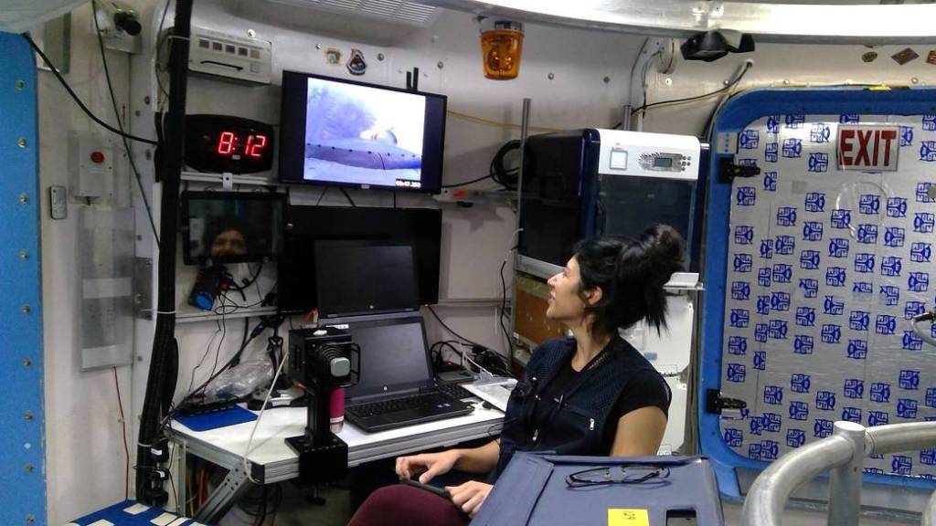 HERA crew member Monique Garcia watches her spacecraft “launch” on a monitor during a simulated mission to Mars. 
