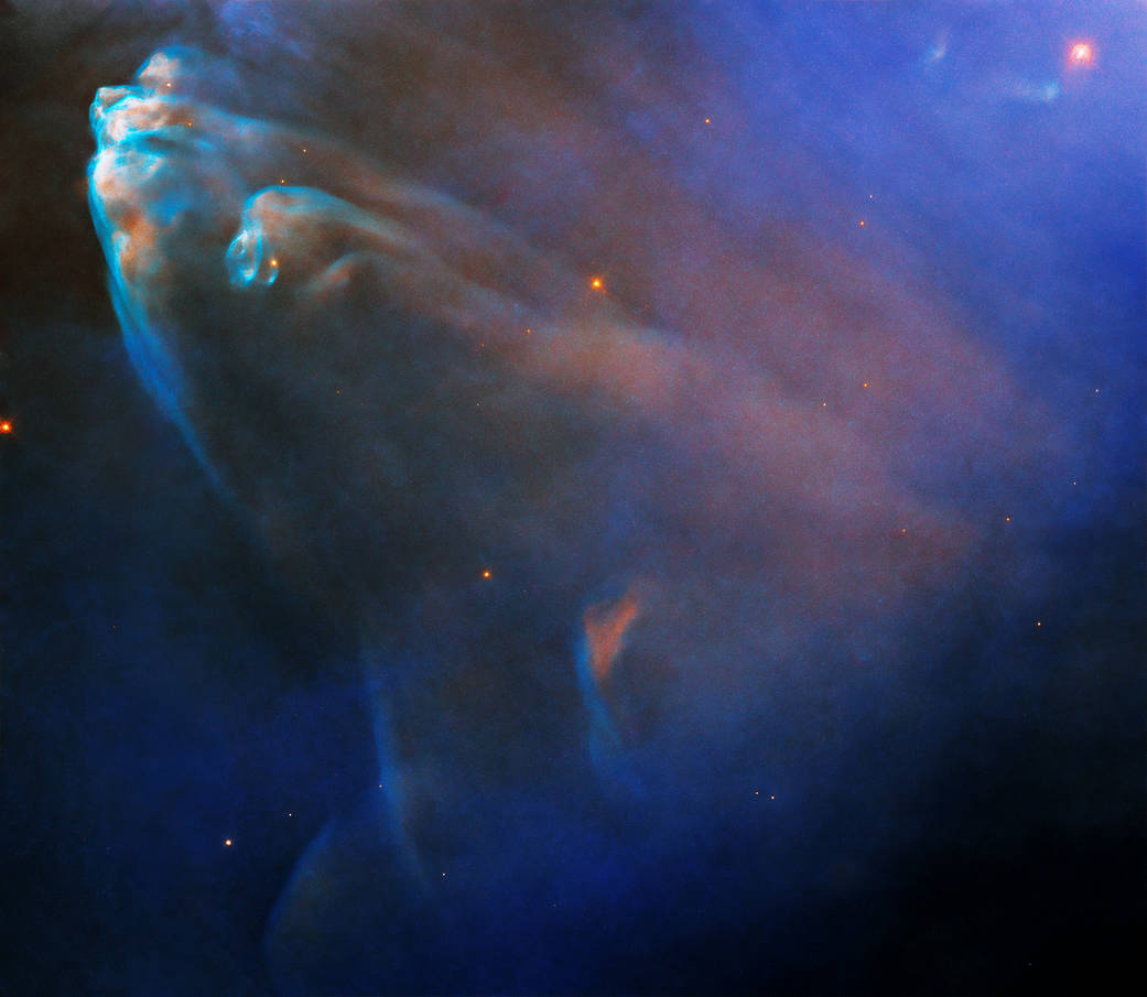 Hubble image of elongated rusty and blue nebula "fingers" whose tips are bright-blue and white