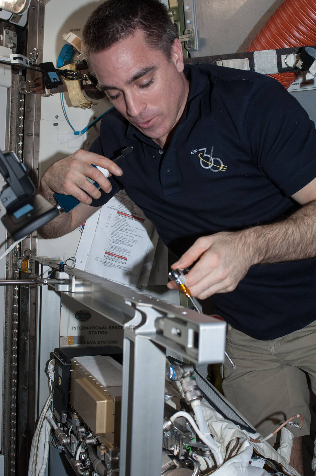 Chris Cassidy Works on a Spacesuit