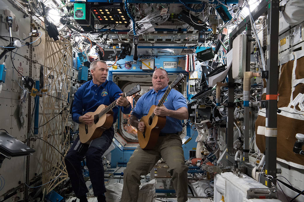 Astronauts Drew Feustel and Scott Tingle Play Guitar