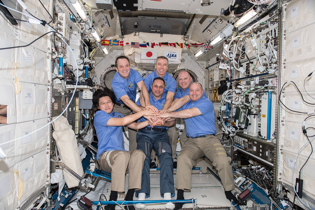 The six-member Expedition 55 crew