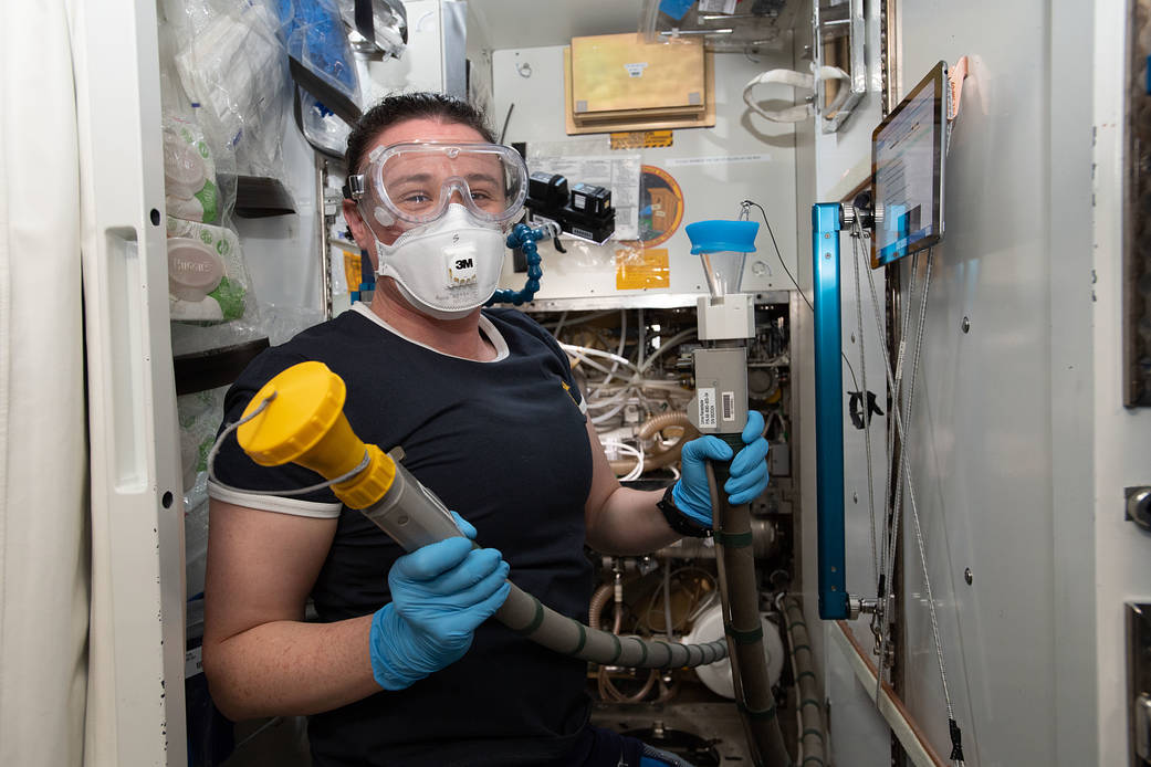 NASA astronaut Serena Auñón-Chancellor performs plumbing duties