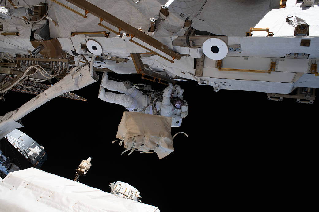 Astronaut Andrew Morgan is tethered to the space station