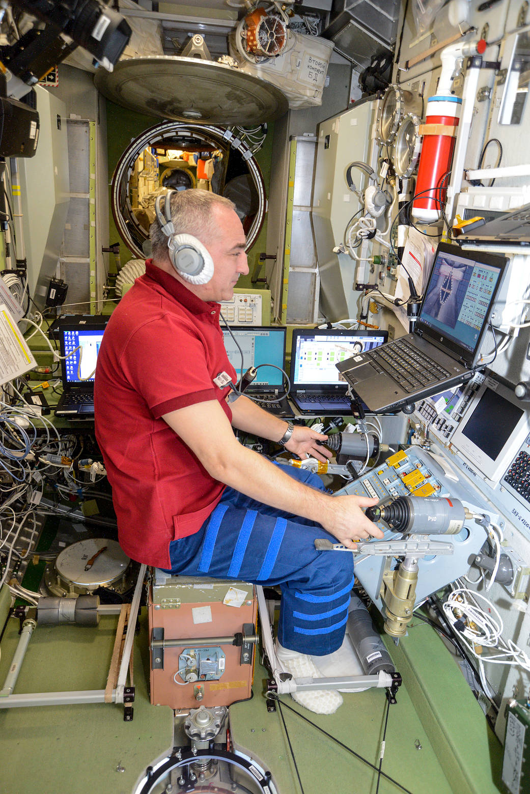 Roscosmos cosmonaut Alexander Skvortsov trains on a computer