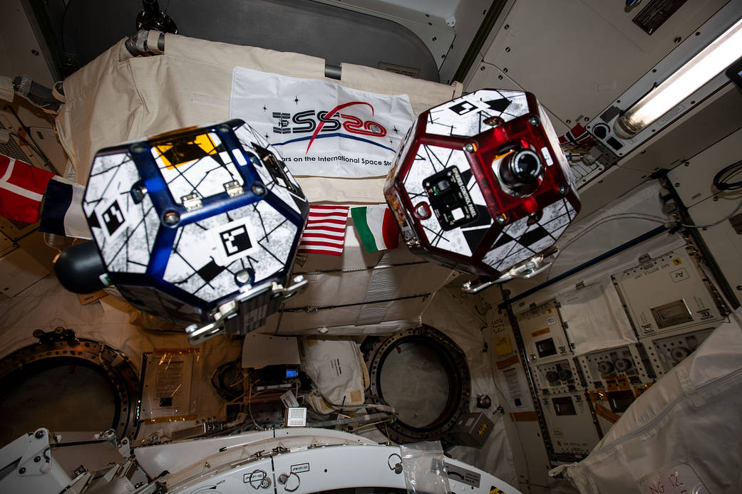 A pair of tiny, free-floating satellites known as SPHERES