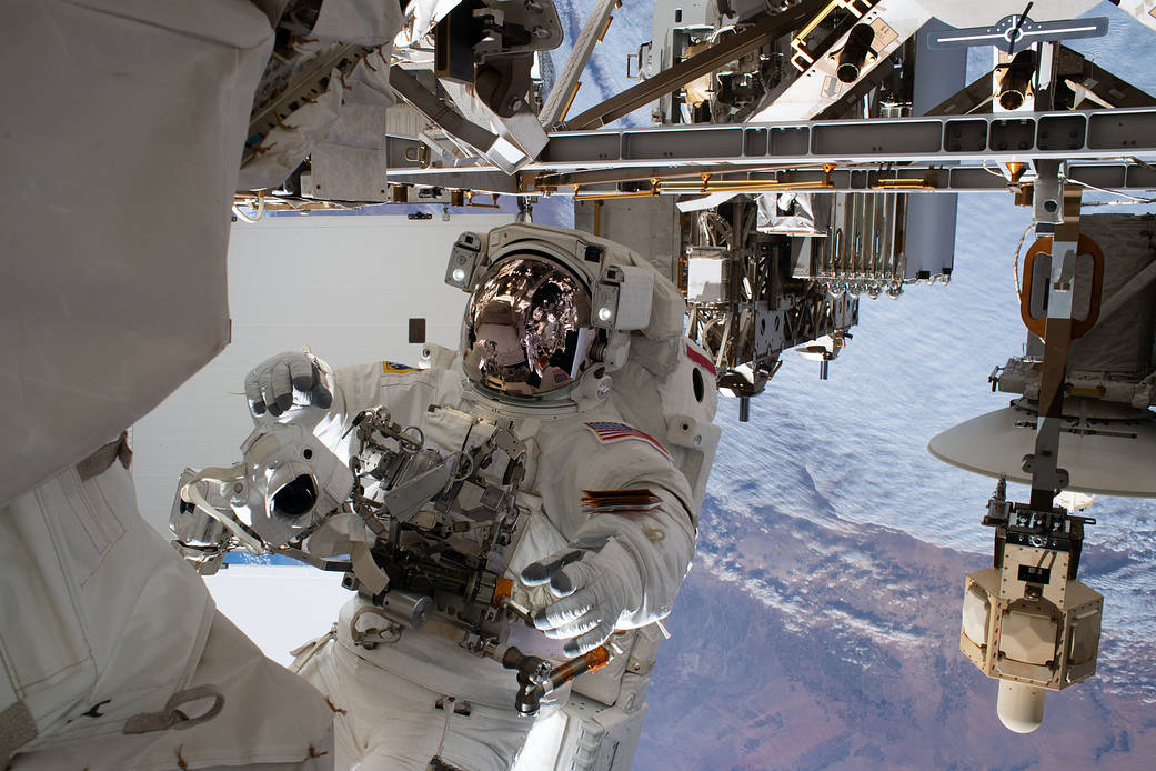 NASA astronaut Andrew Morgan is tethered to the space station - NASA