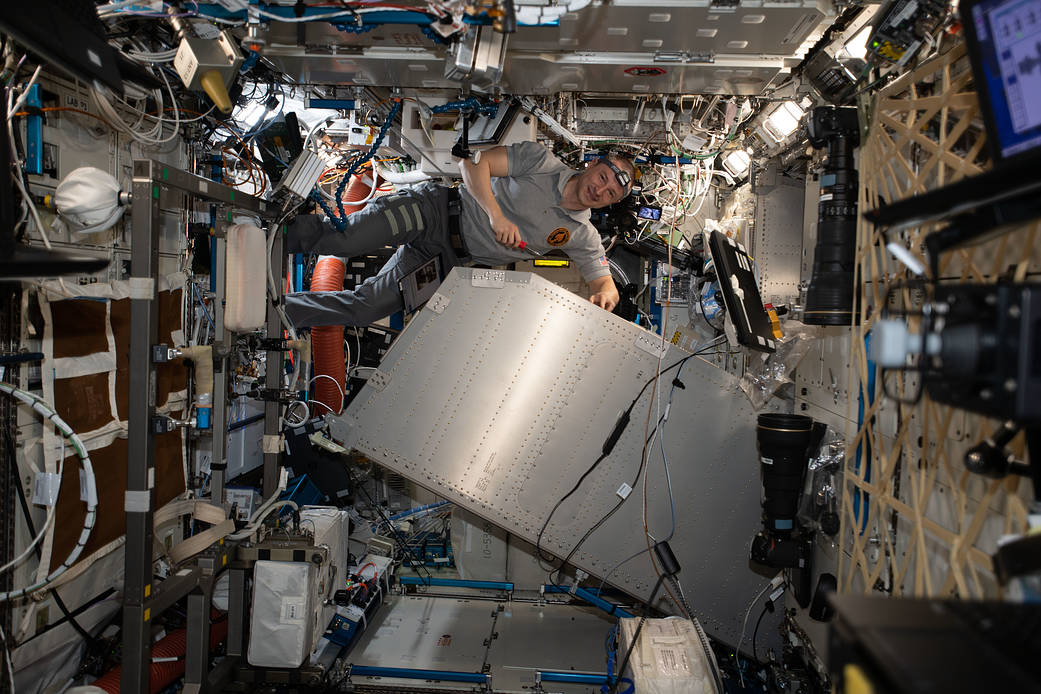 NASA astronaut Andrew Morgan services the Microgravity Science Glovebox