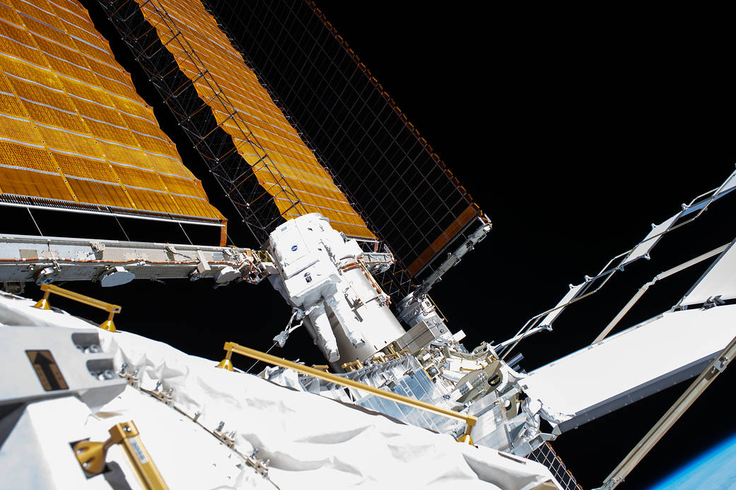 Astronaut Bob Behnken conducts a spacewalk