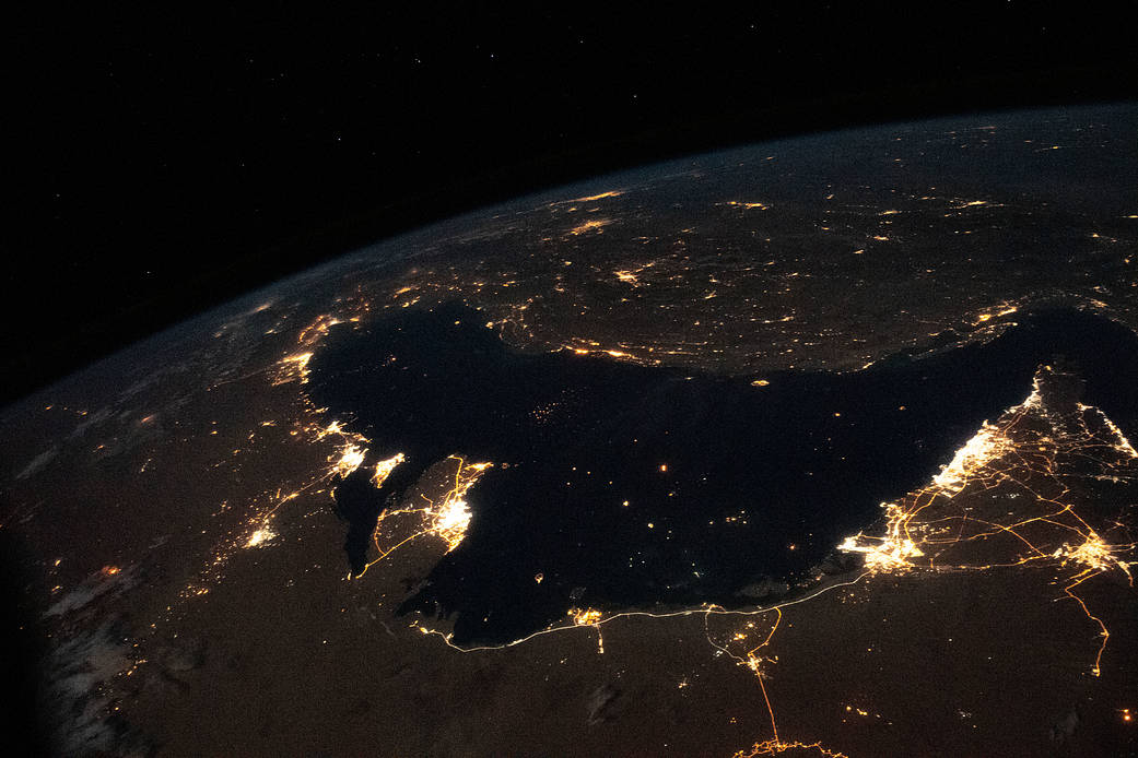 The well-lit Middle Eastern cities along the Persian Gulf coast