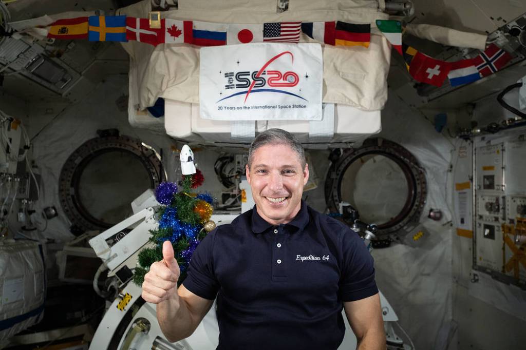 NASA astronaut Michael Hopkins poses for a holiday season portrait