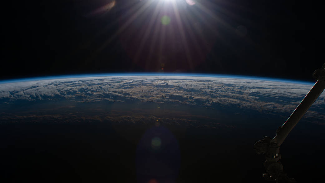An orbital sunrise above the North Pacific
