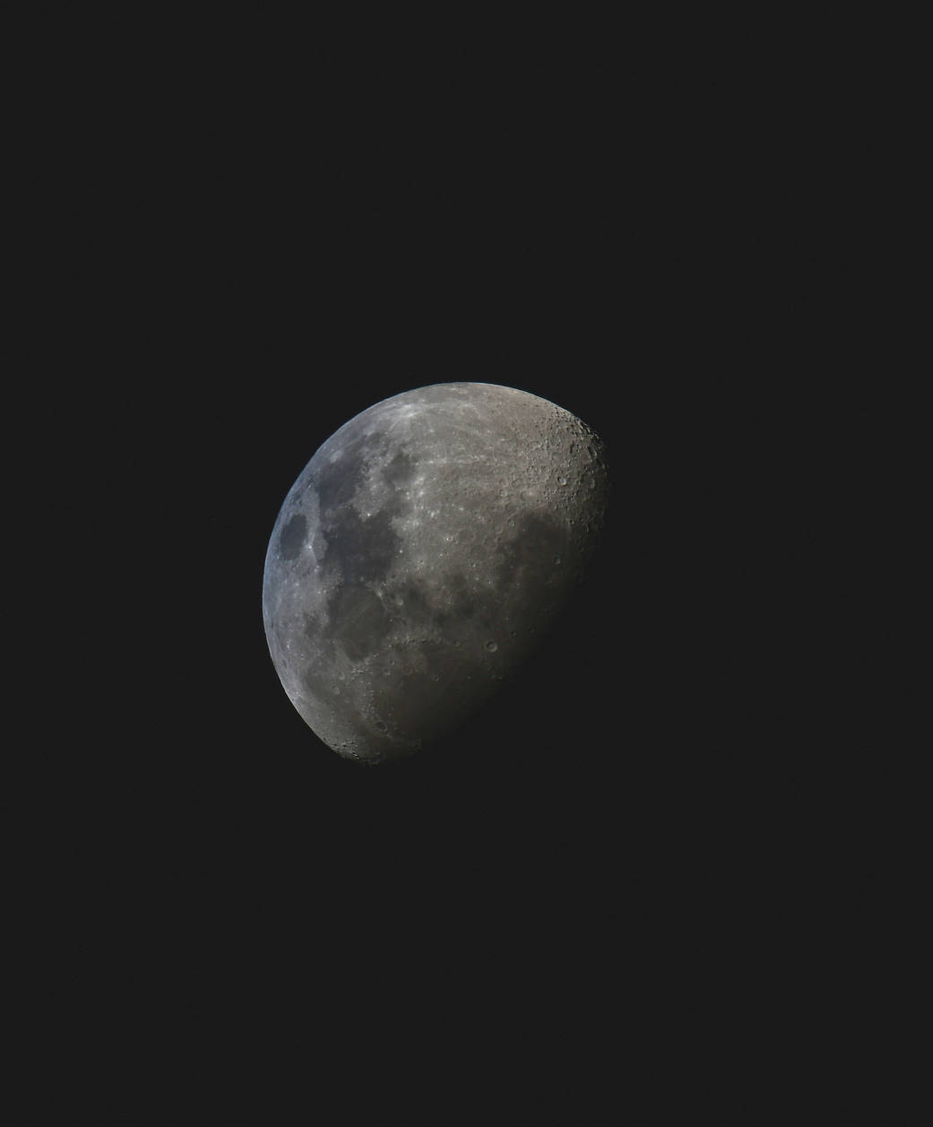 The waxing gibbous Moon above the Pacific Ocean