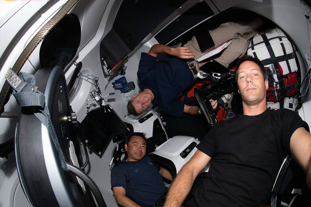 Astronauts inside the SpaceX Crew Dragon Endeavour