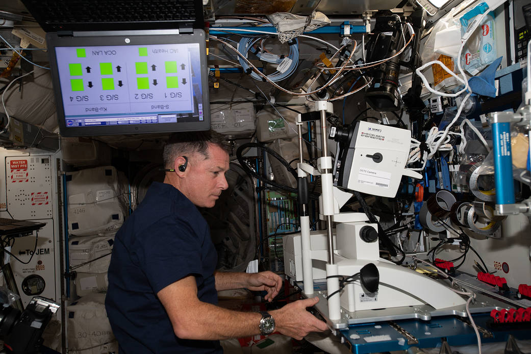 NASA astronaut Shane Kimbrough sets up medical-imaging gear