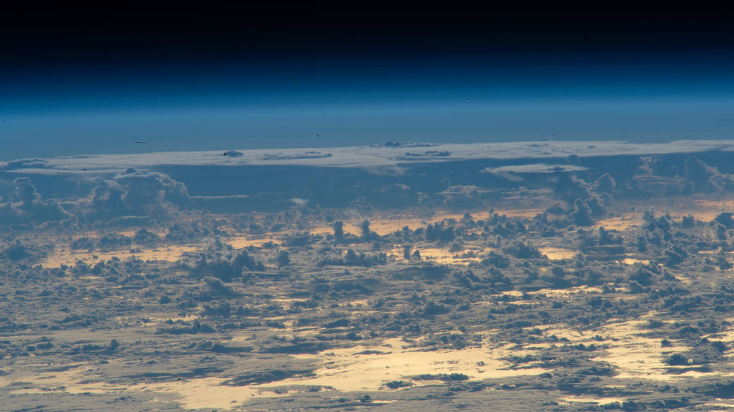 Clouds protrude above the north Atlantic Ocean