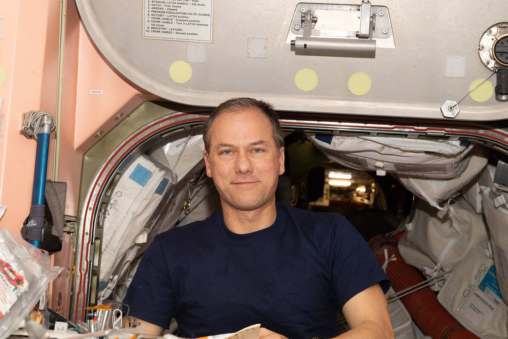 Astronaut Thomas Marshburn poses for a portrait inside the Unity module