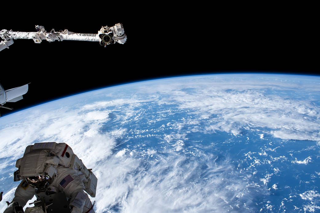 NASA spacewalker Kayla Barron is pictured 263 miles above the Indian Ocean