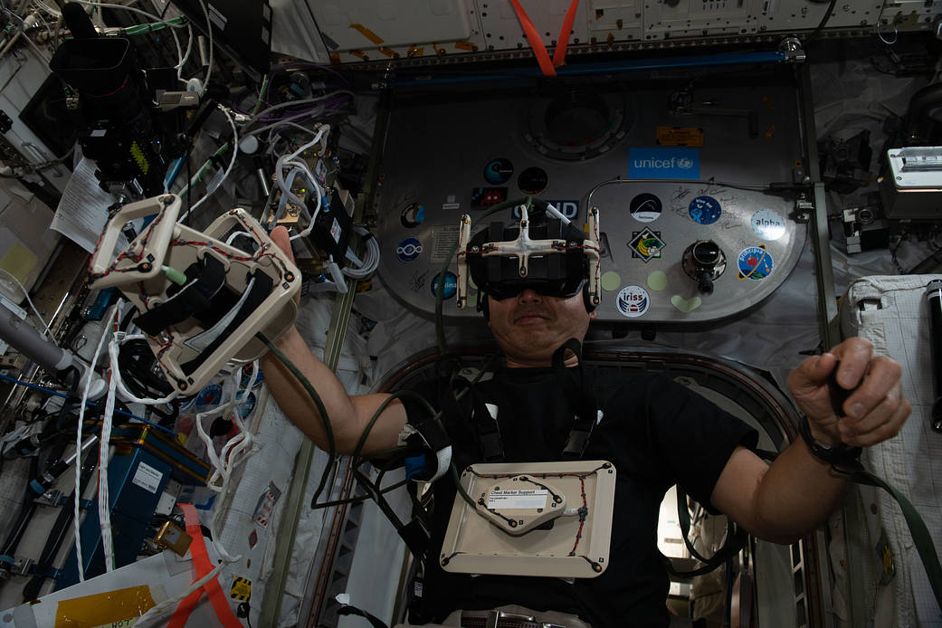 Astronaut Koichi Wakata wears a virtual reality headset