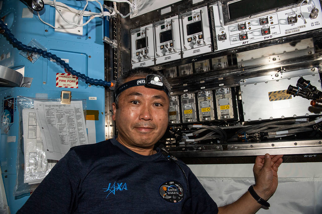Astronaut Koichi Wakata swaps electronics components