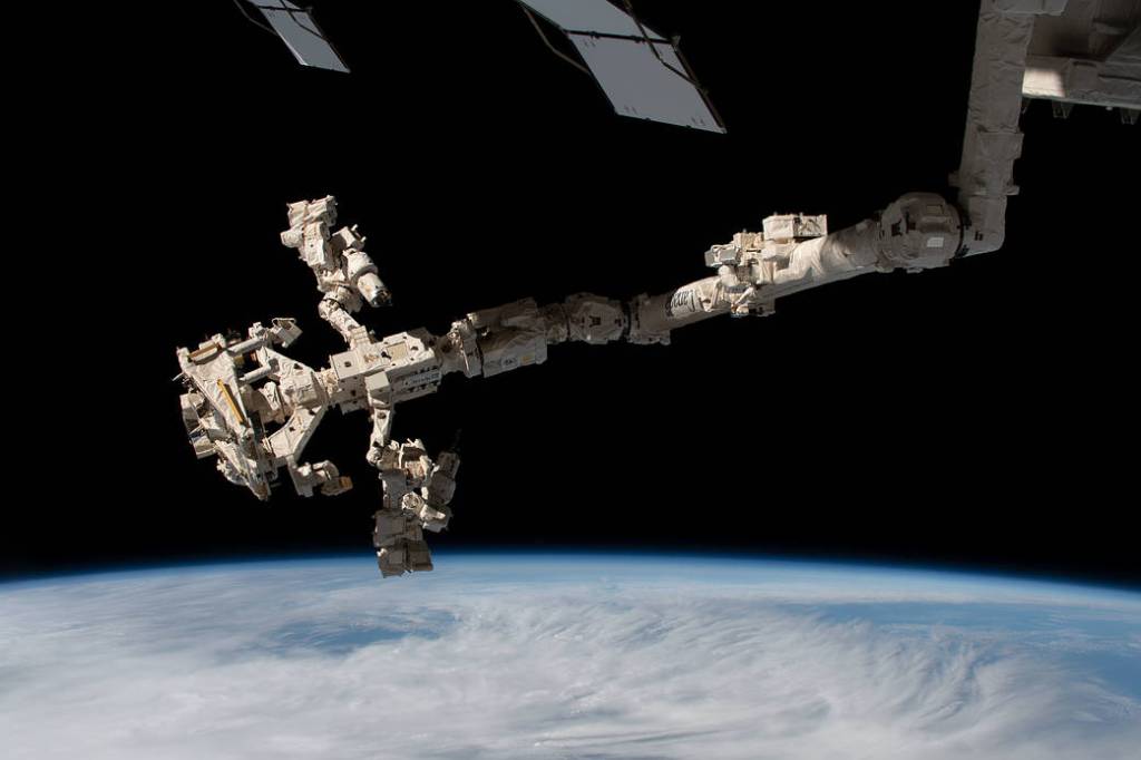 Dextre, the station's fine-tuned robotic hand, is attached to the Canadarm2