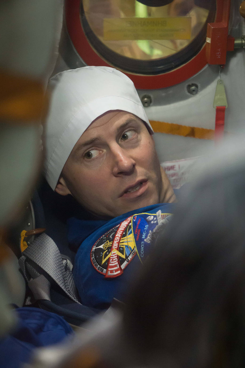 Expedition 57 crew member Nick Hague is seen in the Soyuz MS-10 spacecraft