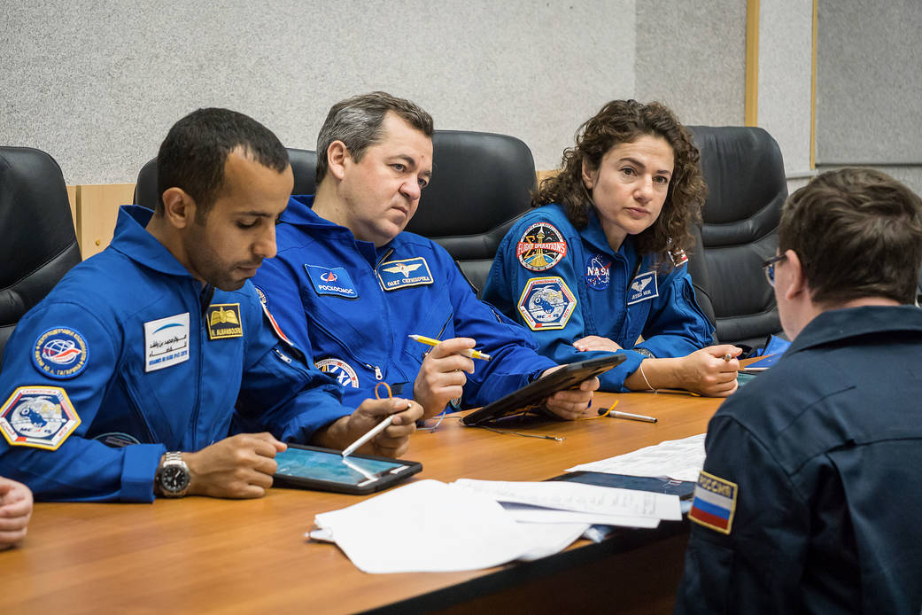 Expedition 61 crew with spaceflight participant reviews flight plan