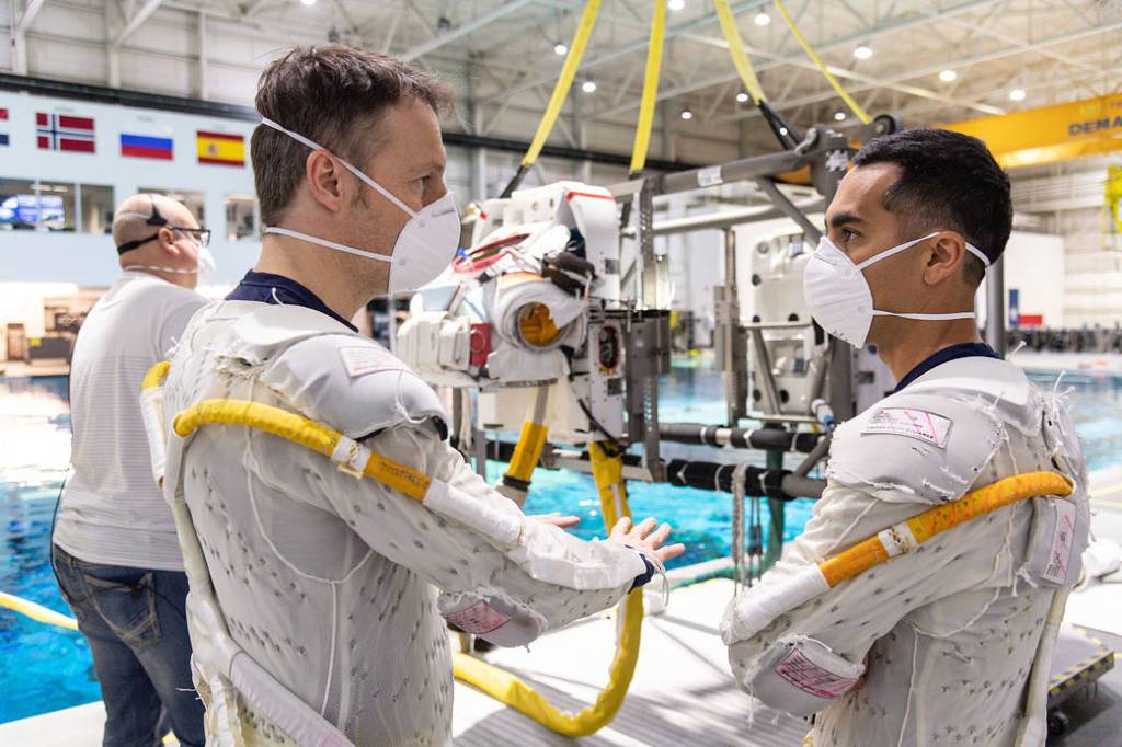 Astronauts Matthias Maurer and Raja Chari prepare for spacewalk training