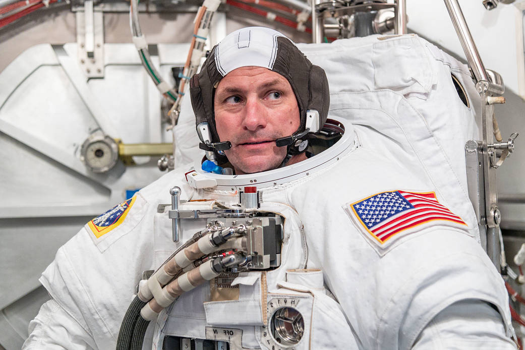 Astronaut Josh Cassada trains in a spacesuit