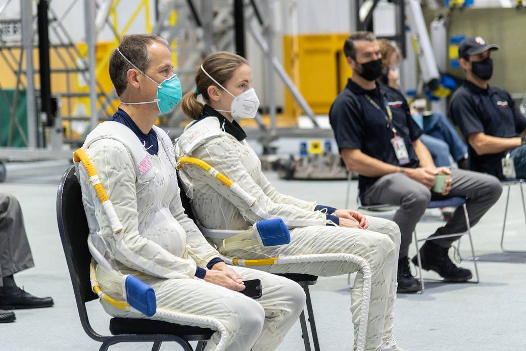 Astronauts Thomas Marshburn and Kayla Barron prepare for spacewalk training