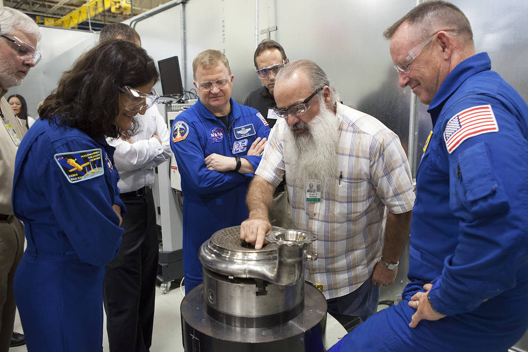 Astronauts discuss RL10 rocket engine with engineer